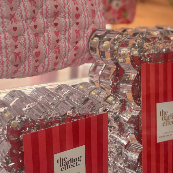 Merle Norman and More The Darling Effect acrylic frames